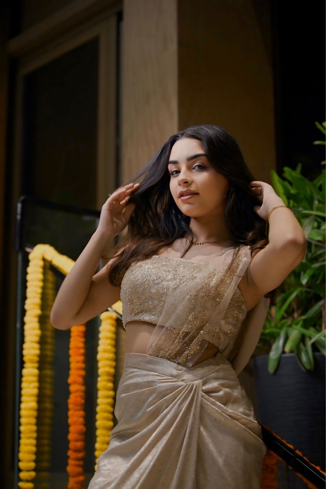 Gold draped saree in foil crepe
