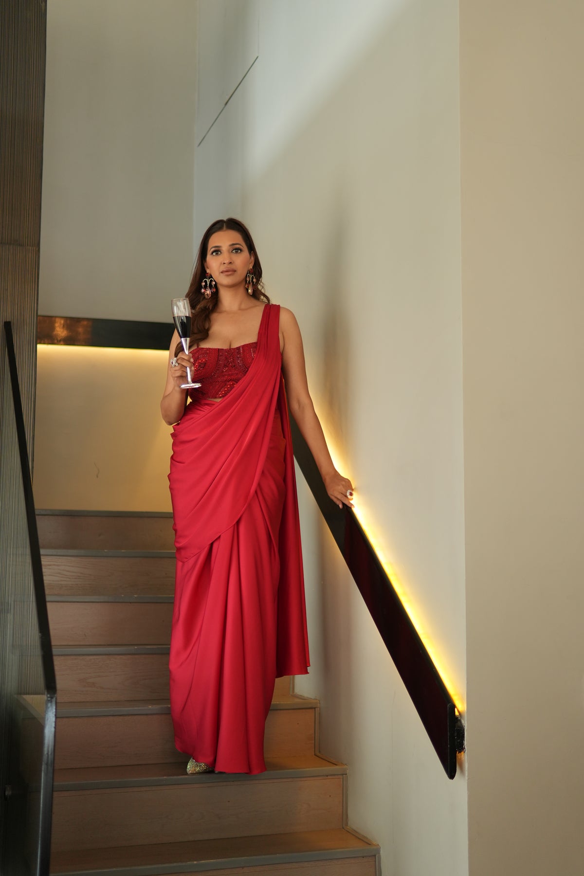 Red Draped Saree With Embroidered Corset Blouse