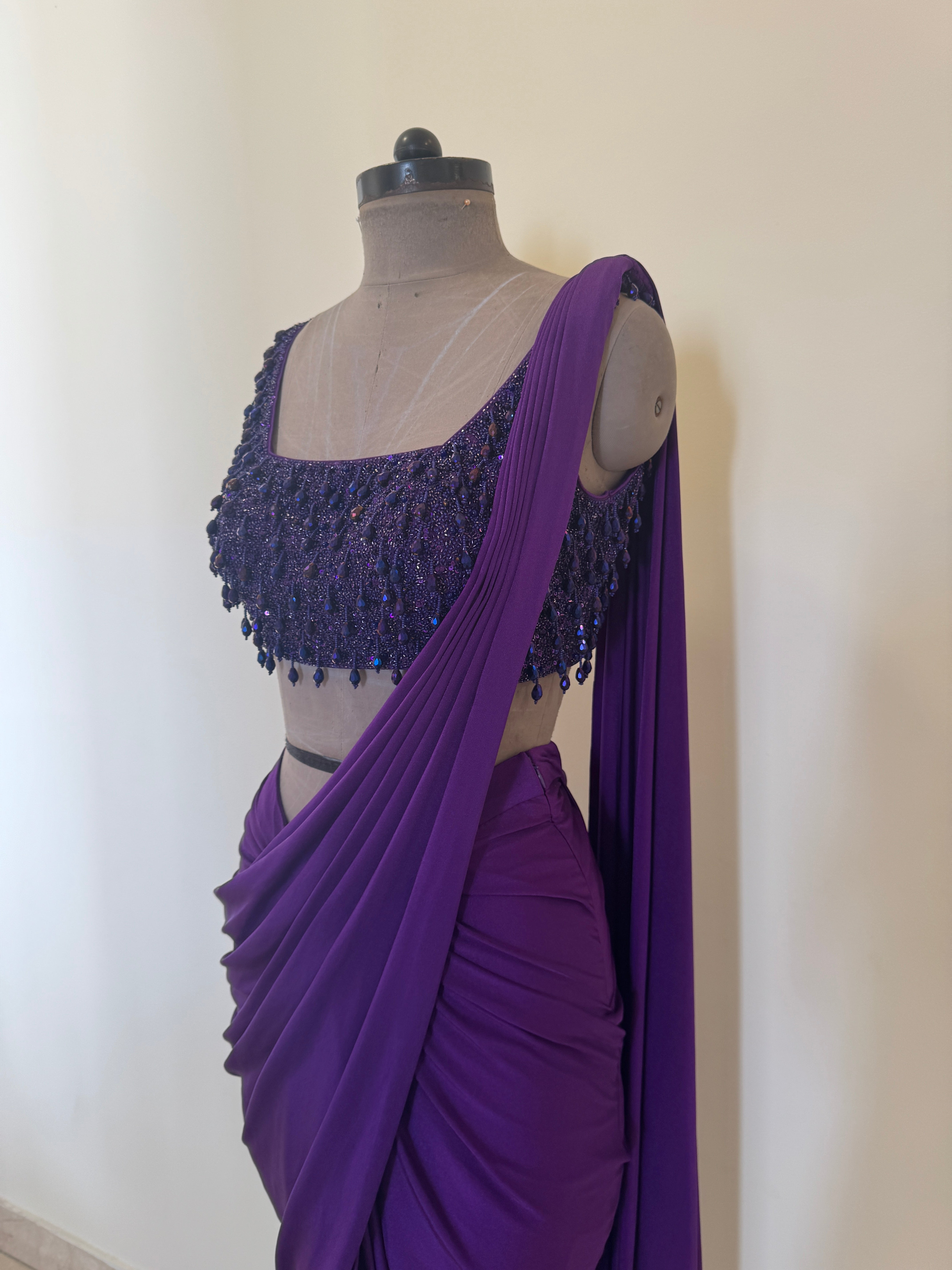 Purple Draped Saree with Drop Tassel Blouse