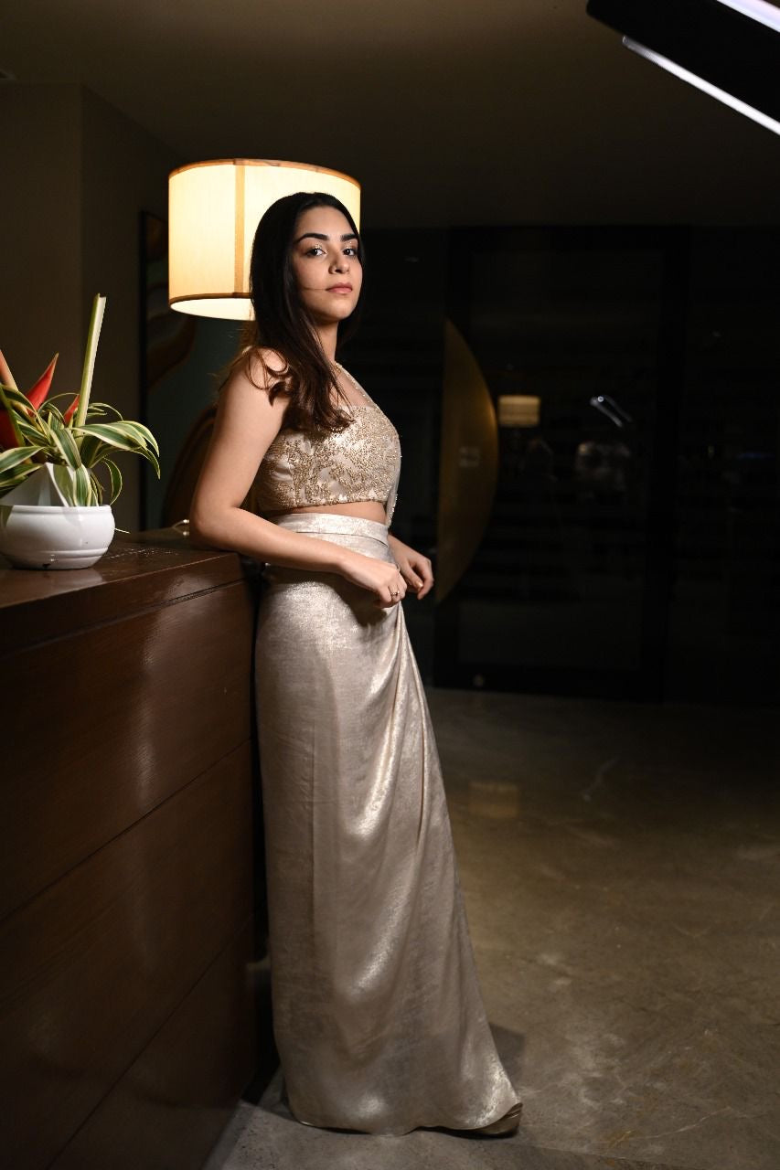 Gold draped saree in foil crepe