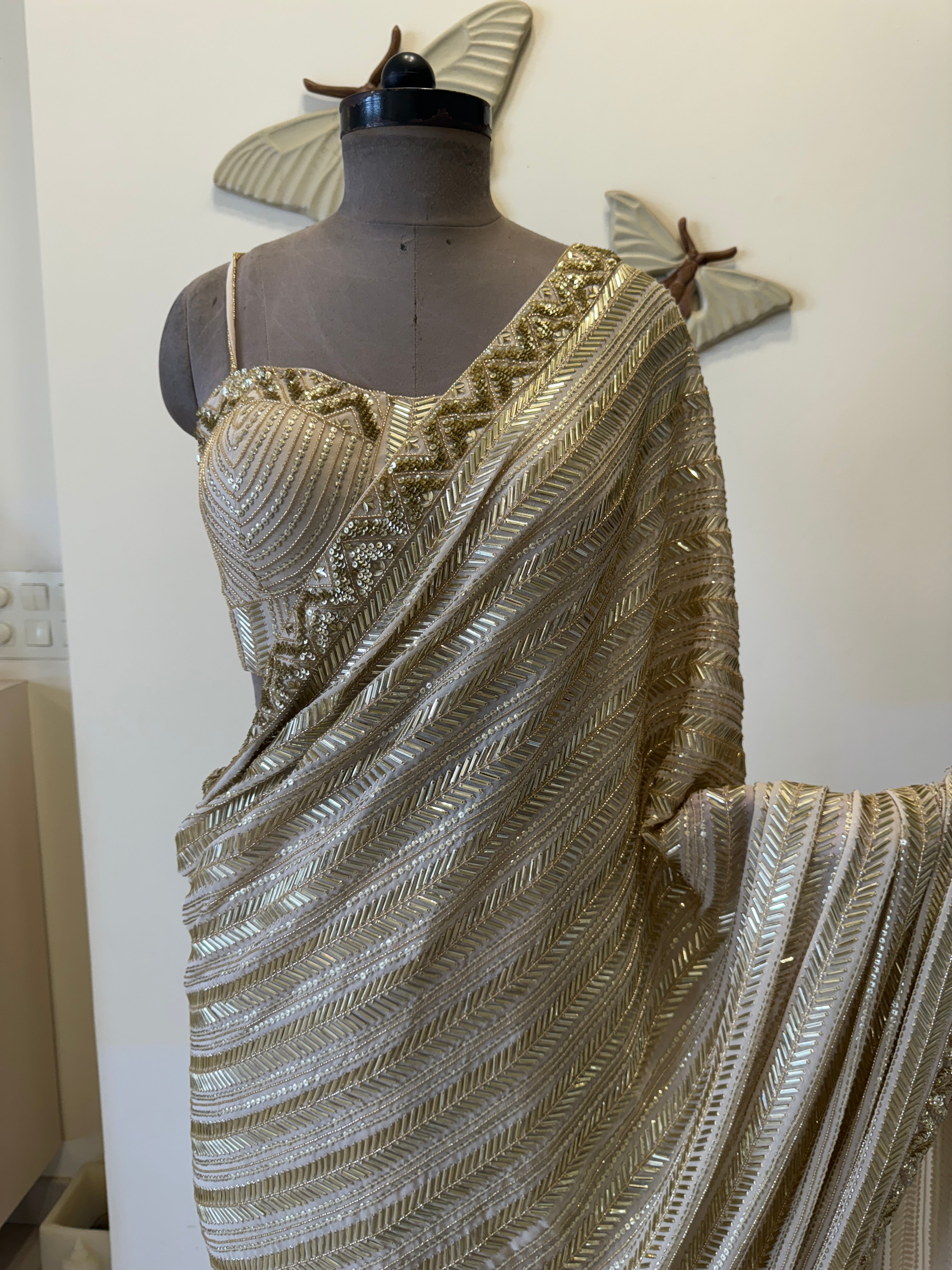 Hand embroidered 6 yard gold saree with corset