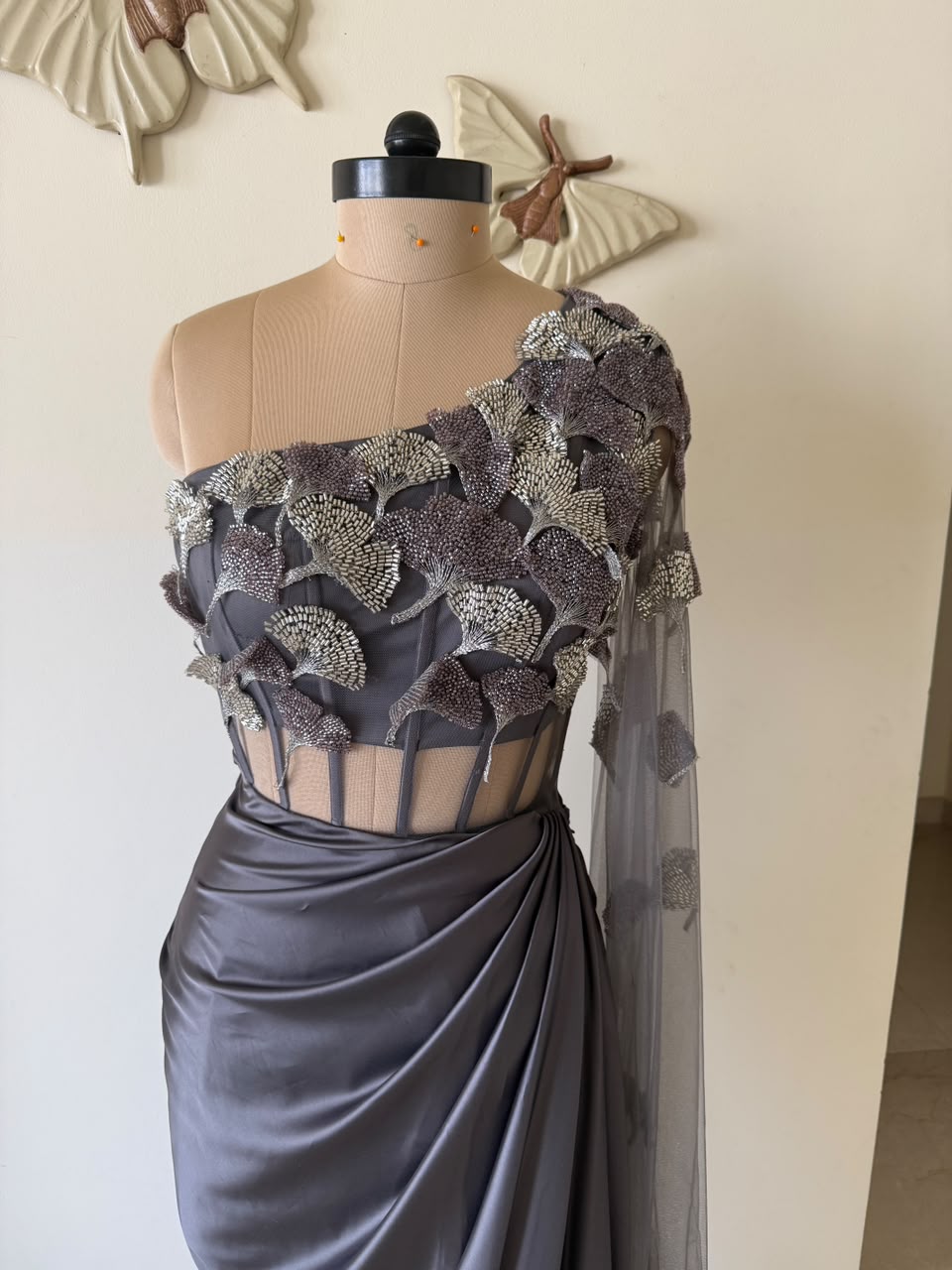 One side off shoulder satin gown with 3D leaf embroidery
